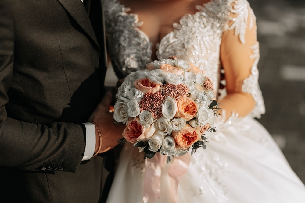 The,Bride,Is,Holding,A,Beautiful,Wedding,Bouquet,Of,Pink